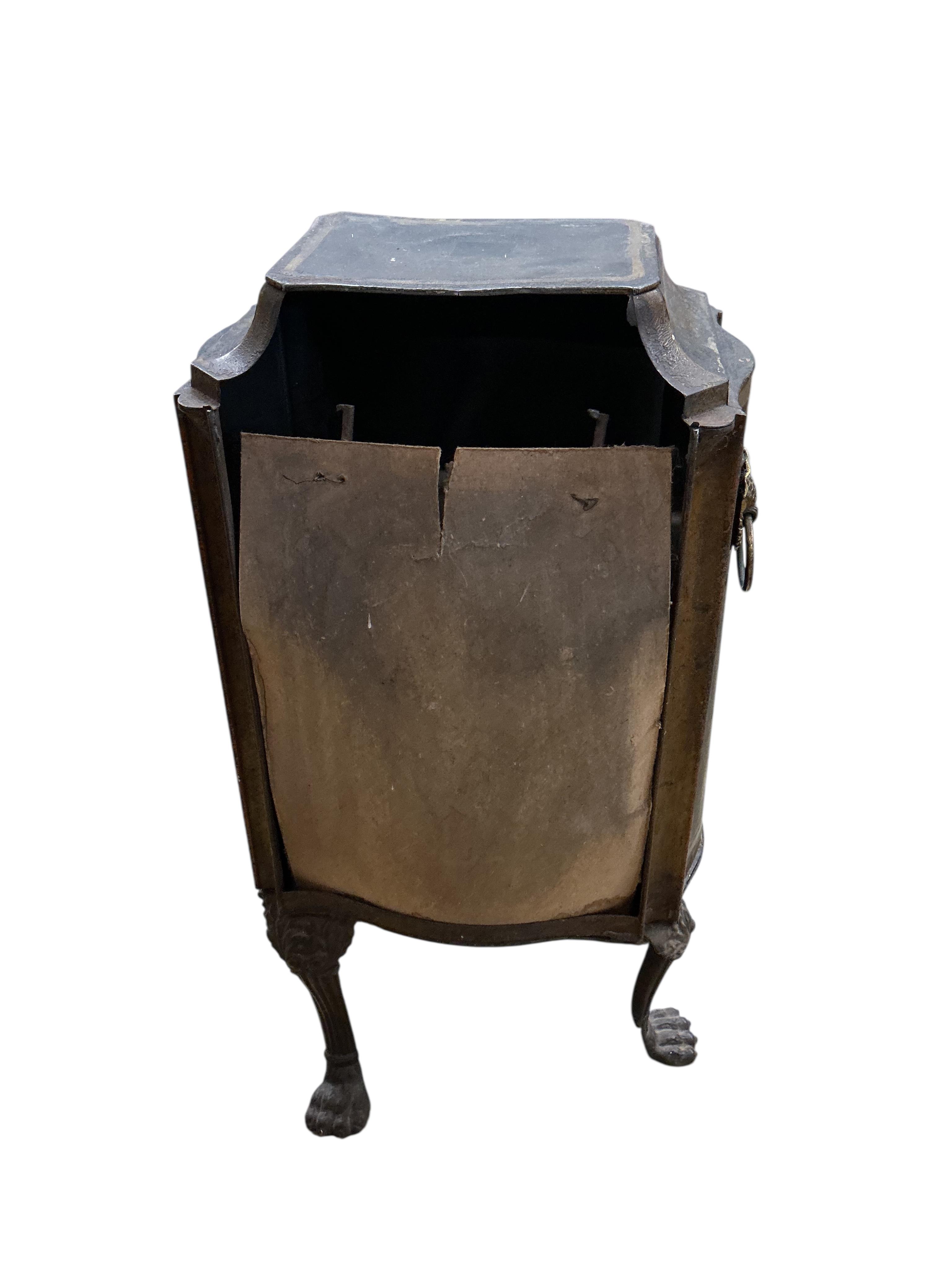 An early 19th century toleware serpentine cabinet, with gilt decoration, width 40cm, depth 30cm, height 76cm